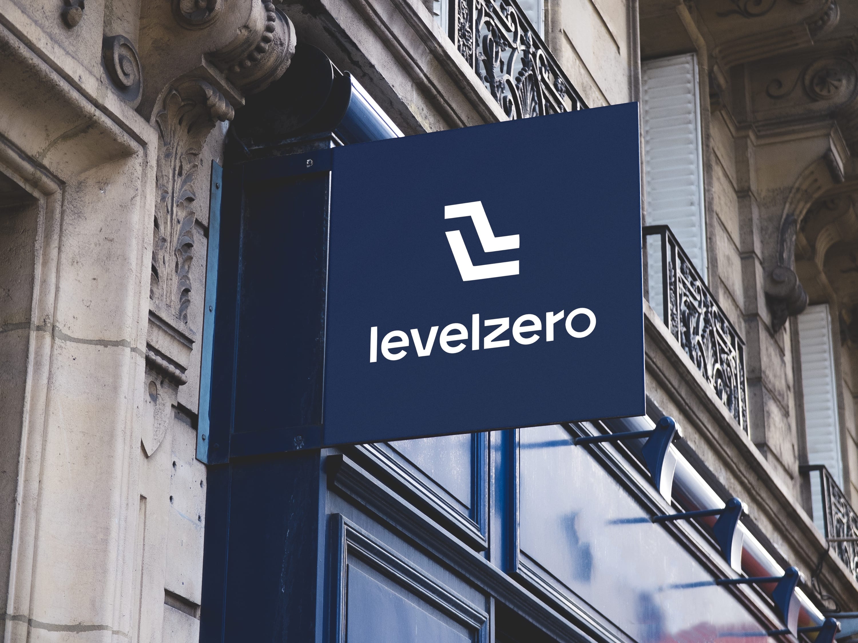 A Level Zero sign hanging outside a stone building